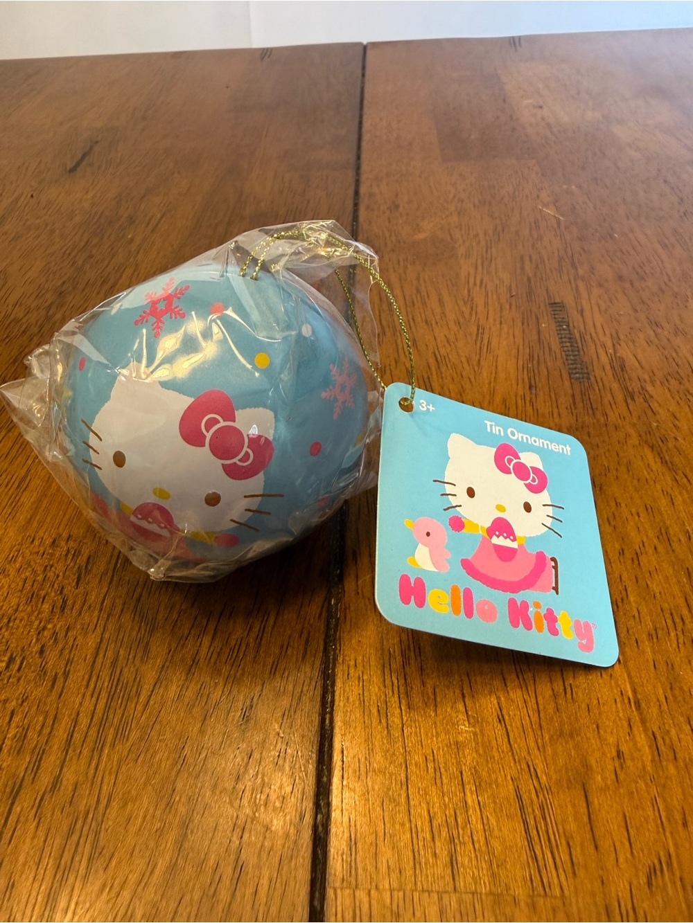 Sanrio Hello Kitty Light Blue and Pink Tin Ornament